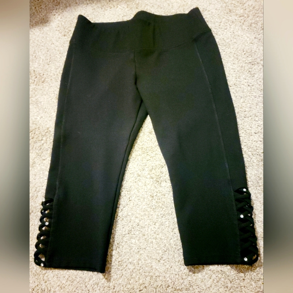 Embellished Capri Pant. Black with diamond accent bottom sides. Size 14/16 XL.